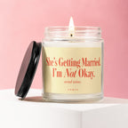 Candle with "She's Getting Married. I'm Not Okay. send wine." text.