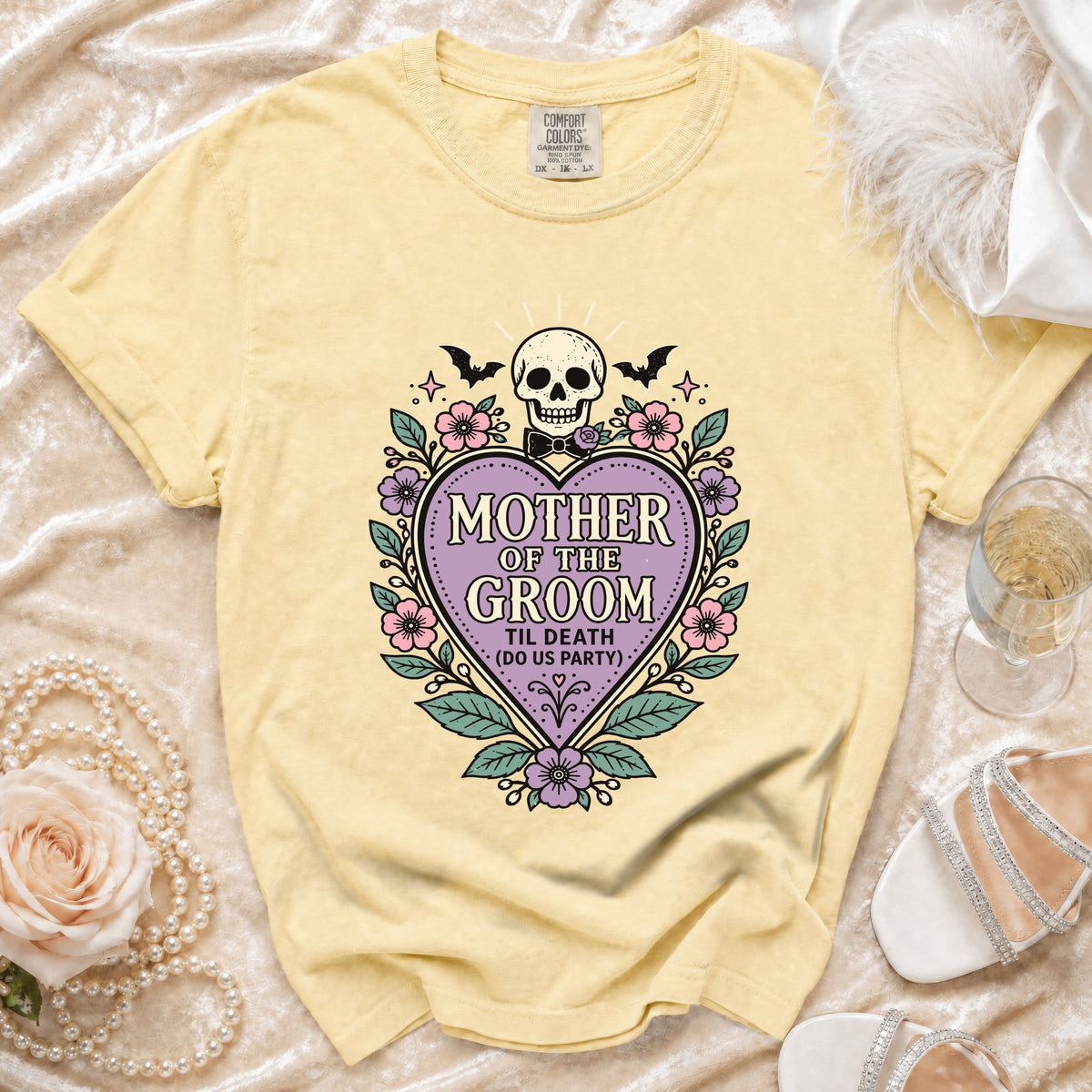 Yellow t-shirt with "Mother of the Groom Til Death (Do Us Party)" text and skull graphic.
