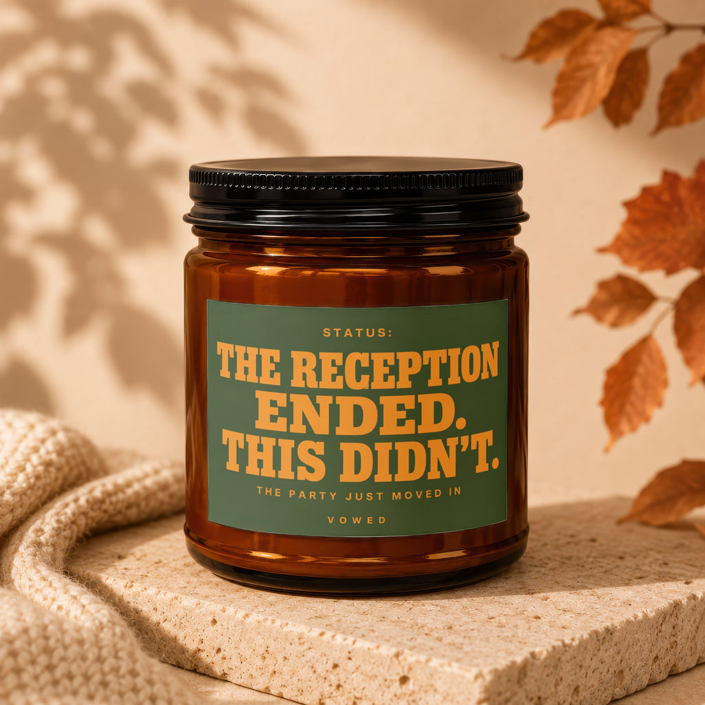 Amber candle with green label stating "STATUS: THE RECEPTION ENDED. THIS DIDN'T."
