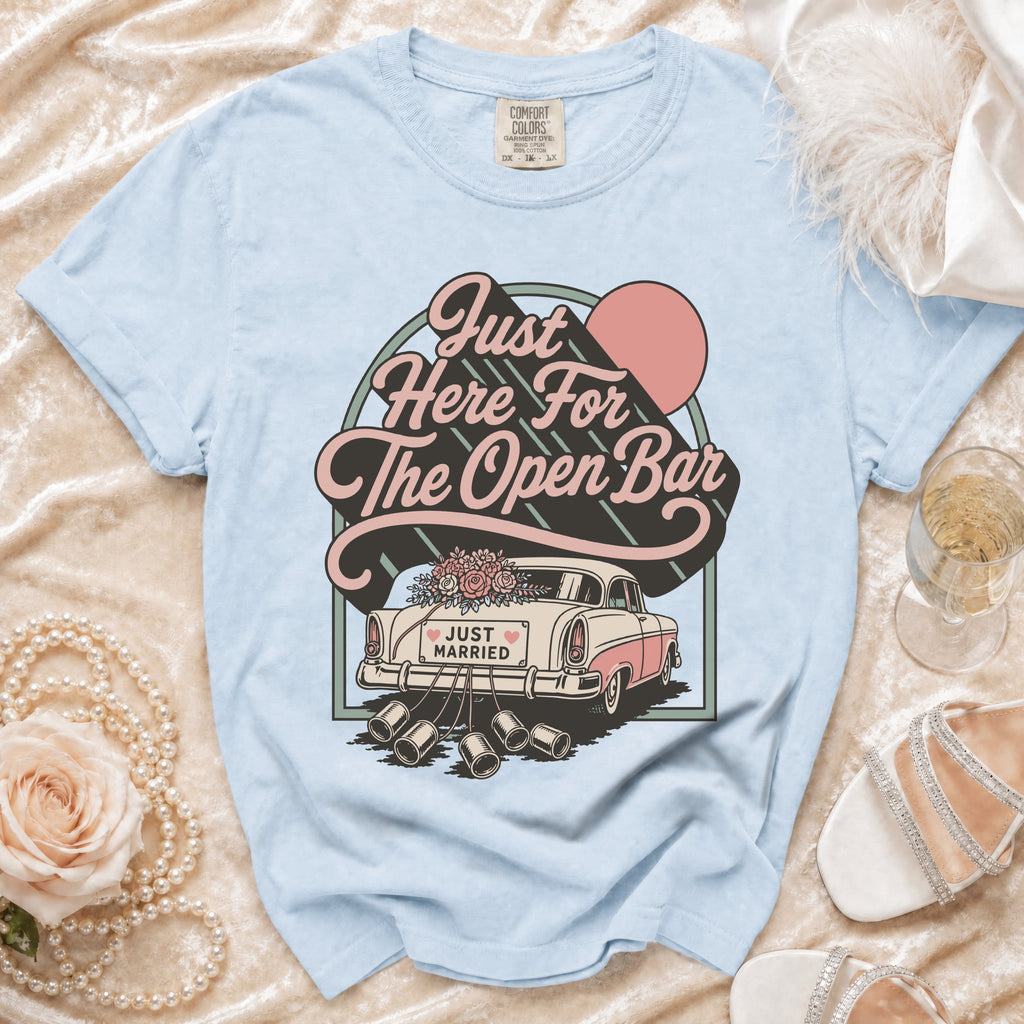 Light blue Comfort Colors t-shirt with "Just Here For The Open Bar" and a "Just Married" car graphic.