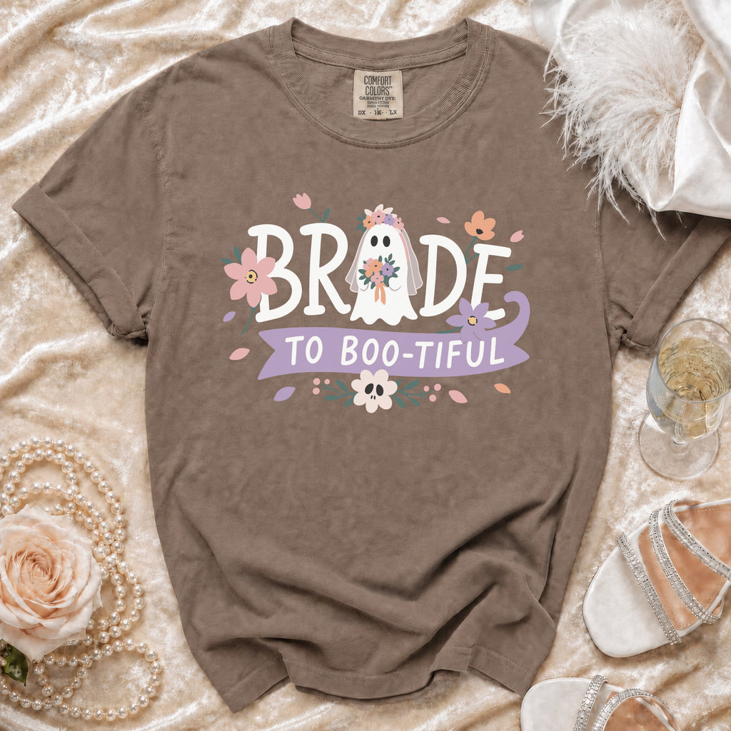 Brown t-shirt with "Bride to Boo-tiful" text and a ghost bride graphic.