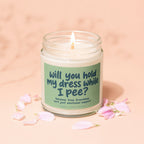 Candle with text "Will you hold my dress while I pee? because true friendship isn't just emotional support"