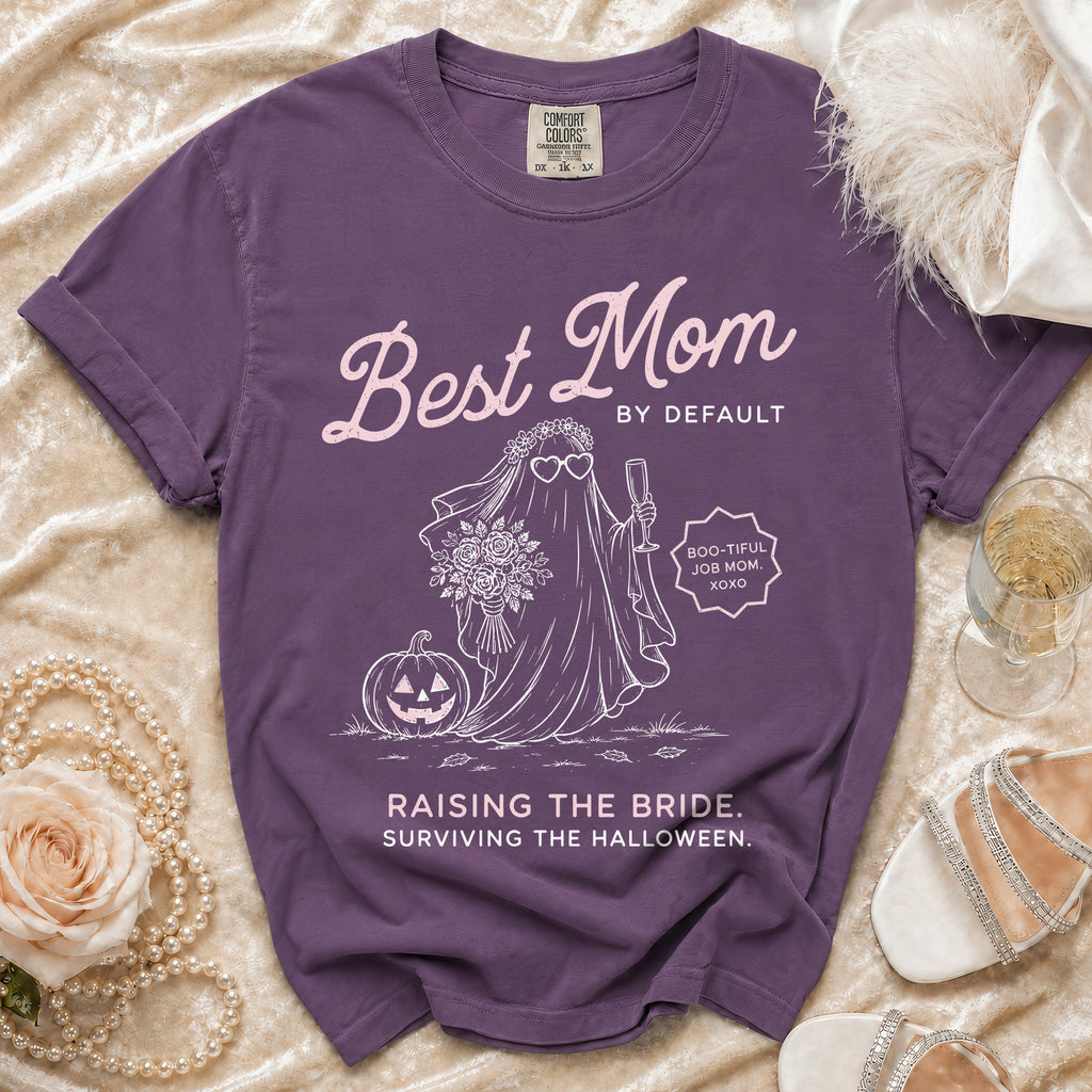 Purple Comfort Colors t-shirt with "Best Mom By Default" and Halloween ghost bride graphic.