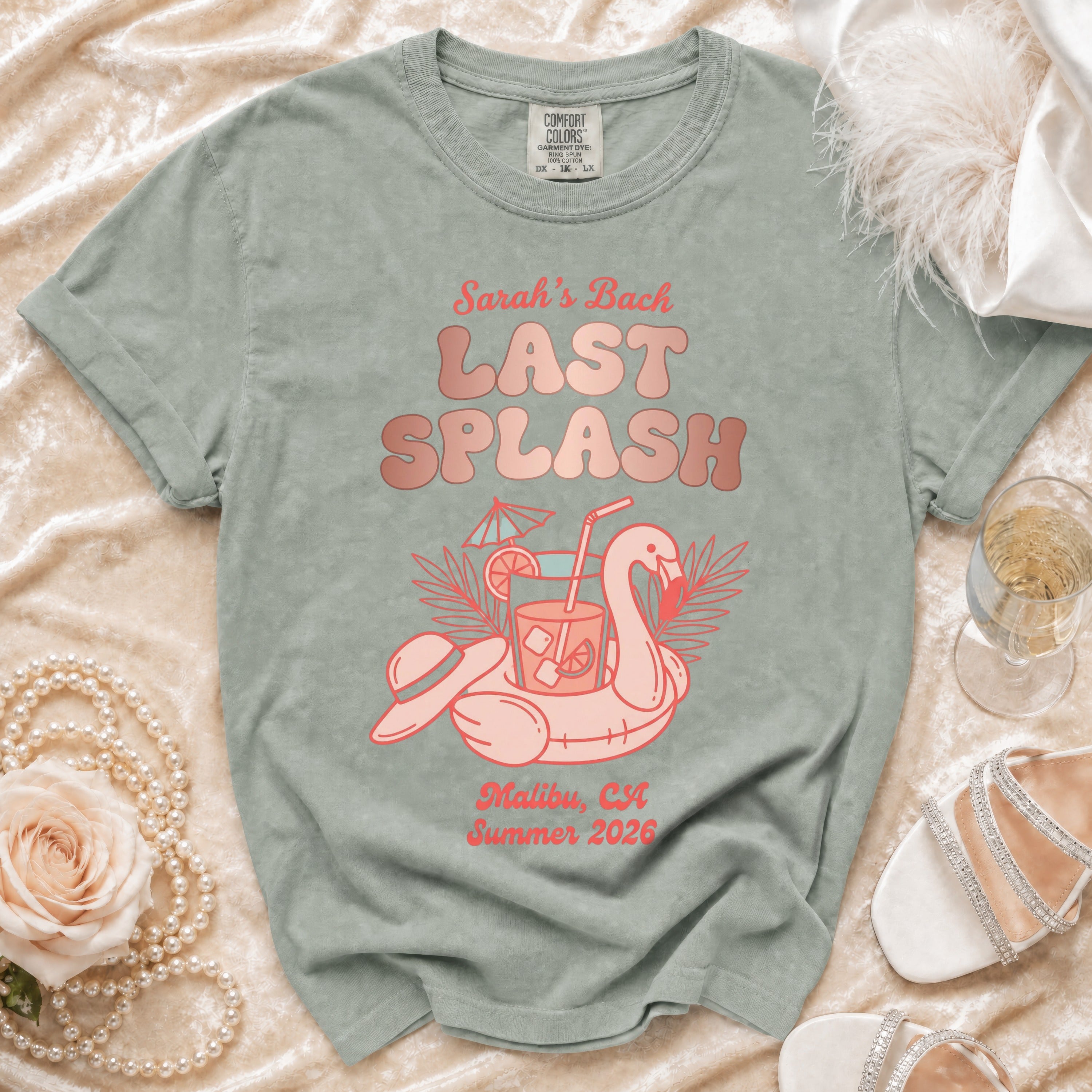 "Last Splash" design on a sage green t-shirt with "Sarah's Bach" and "Malibu, CA Summer 2026".