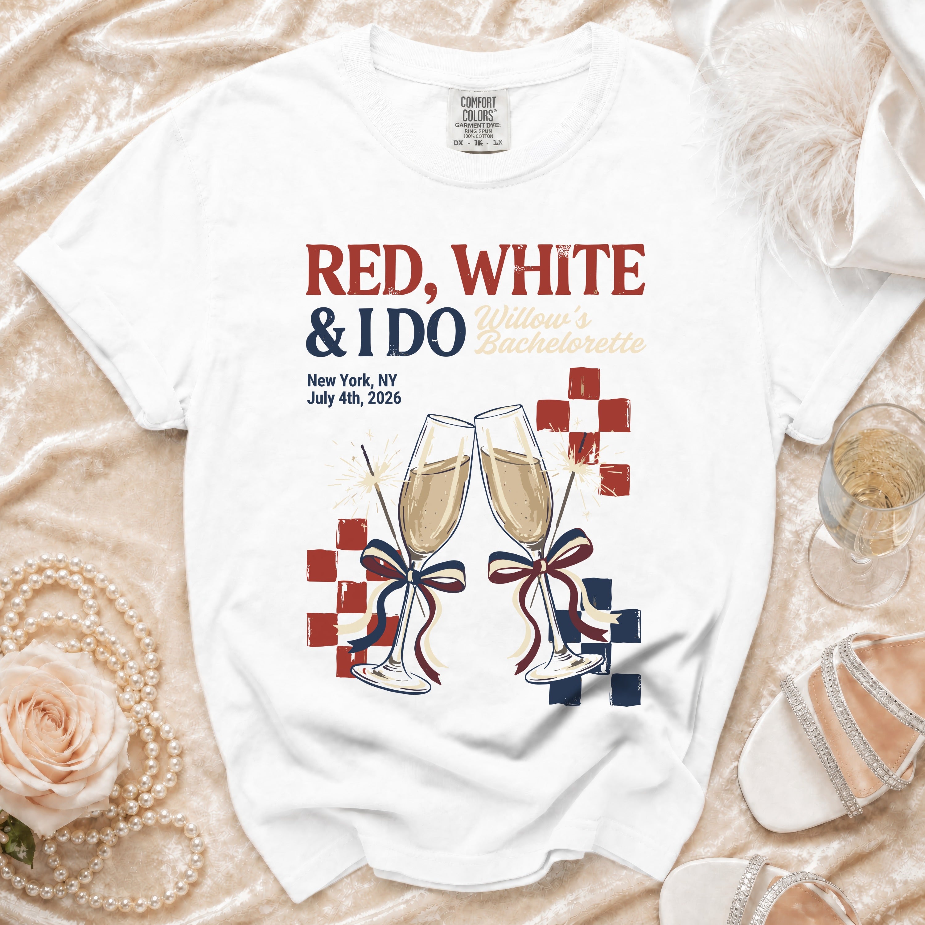 White t-shirt with "Red, White & I Do Bachelorette" text and champagne glasses.