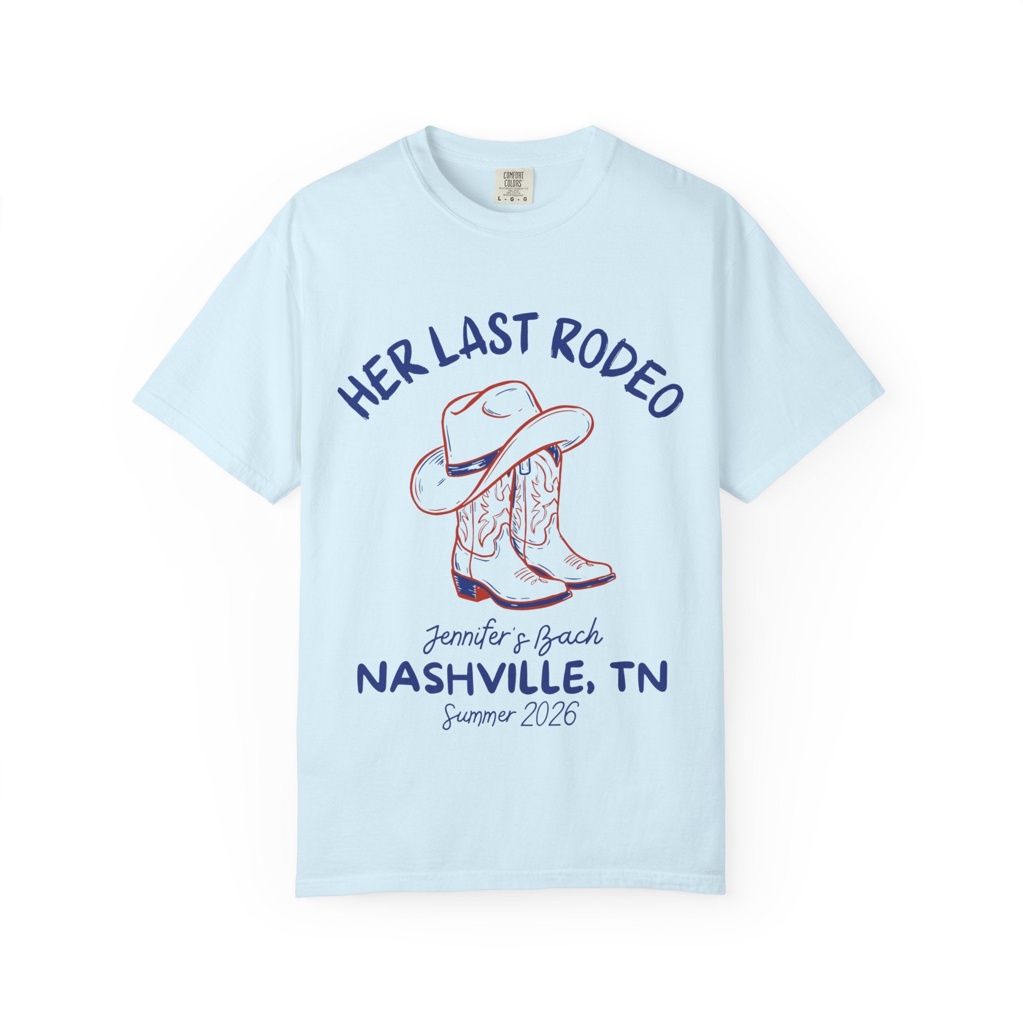 Light blue t-shirt with cowboy hat, boots, and "Her Last Rodeo" text.