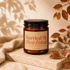 Amber candle with black lid and "Married My Best Friend" label.