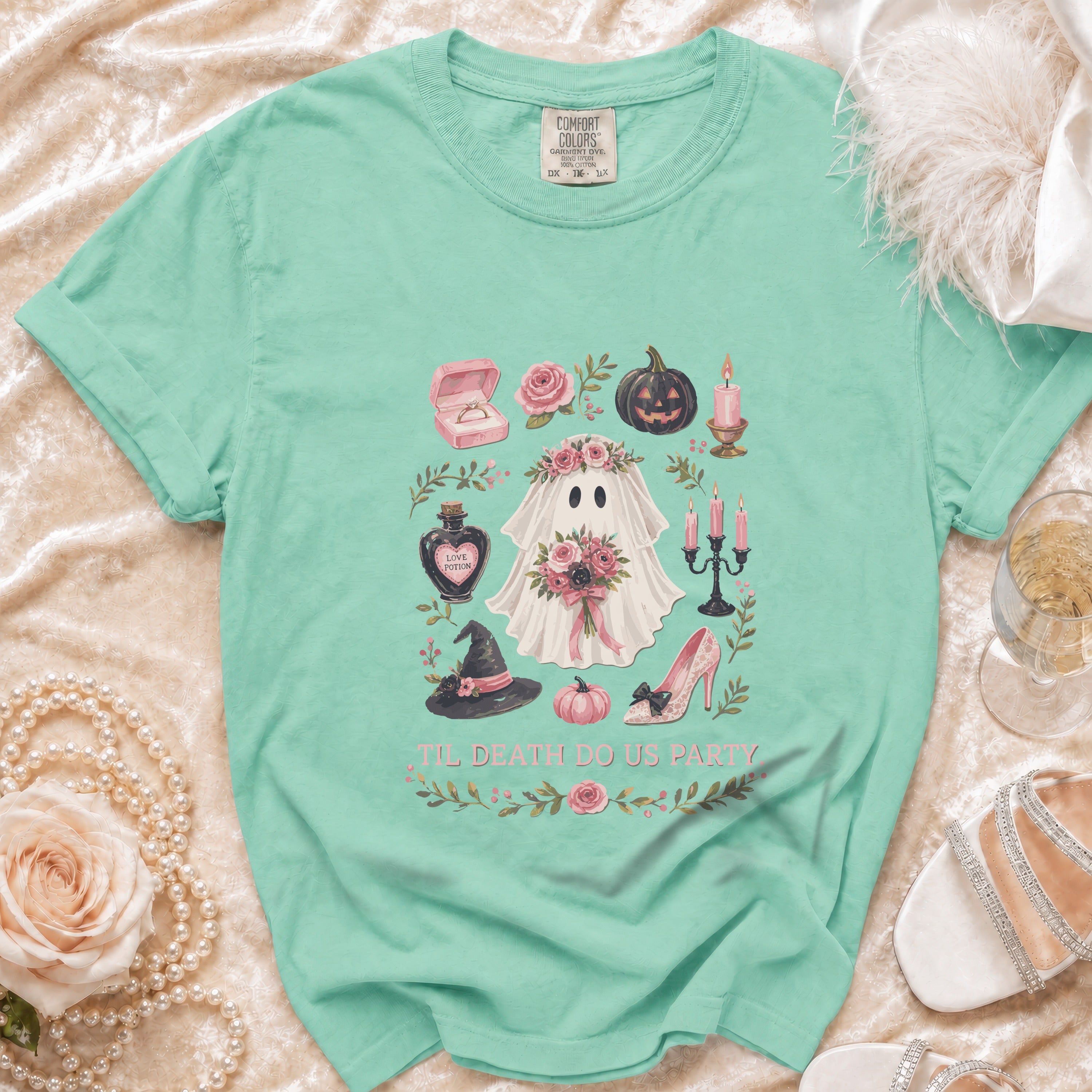 Mint t-shirt with ghost, pumpkin, ring, and "Til Death Do Us Party" text.