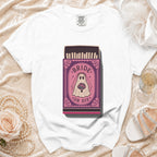 White t-shirt with a "Bride or Die" ghost graphic on a matchbox.