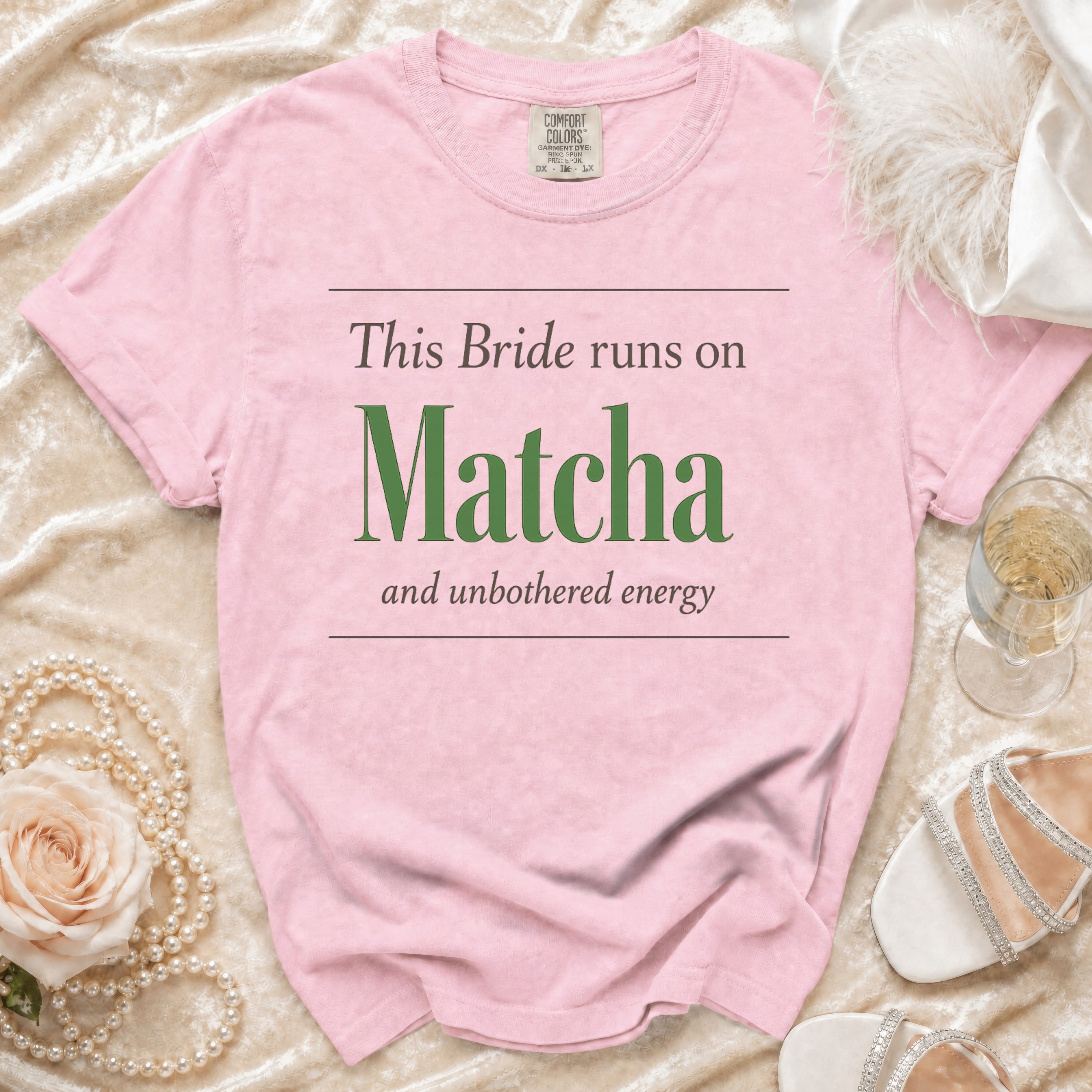 Pink t-shirt with "This Bride runs on Matcha and unbothered energy" text.
