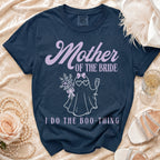 Navy t-shirt with "Mother of the Bride I Do the Boo-Thing" graphic.