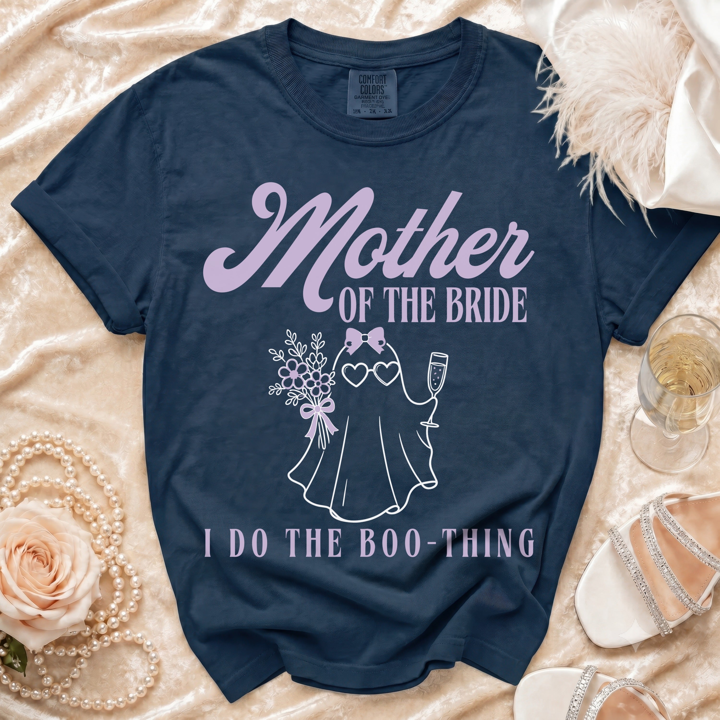 Navy t-shirt with "Mother of the Bride I Do the Boo-Thing" graphic.