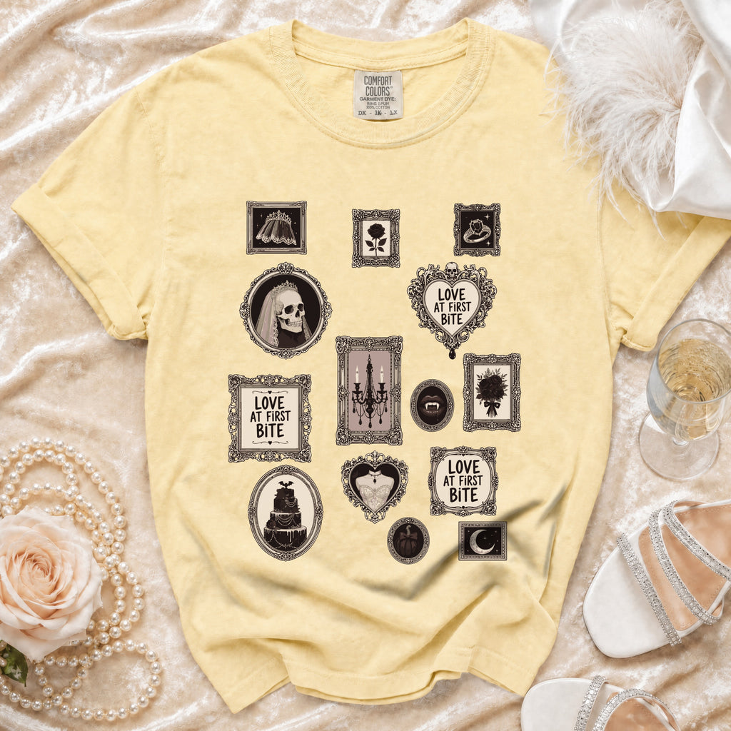 Yellow Comfort Colors t-shirt with gothic wedding-themed icons and "Love at First Bite" text.