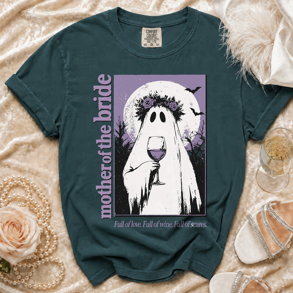 Teal t-shirt with a ghost holding wine, "mother of the bride" text, and quote.