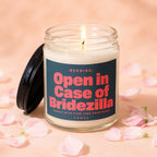 Candle jar with lid askew, featuring text "Open in Case of Bridezilla"