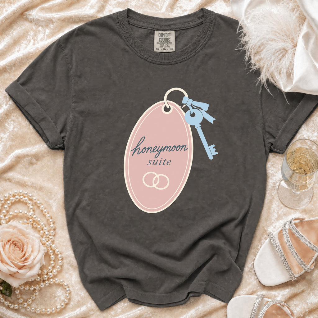 Dark gray t-shirt with "honeymoon suite" text and wedding rings graphic.