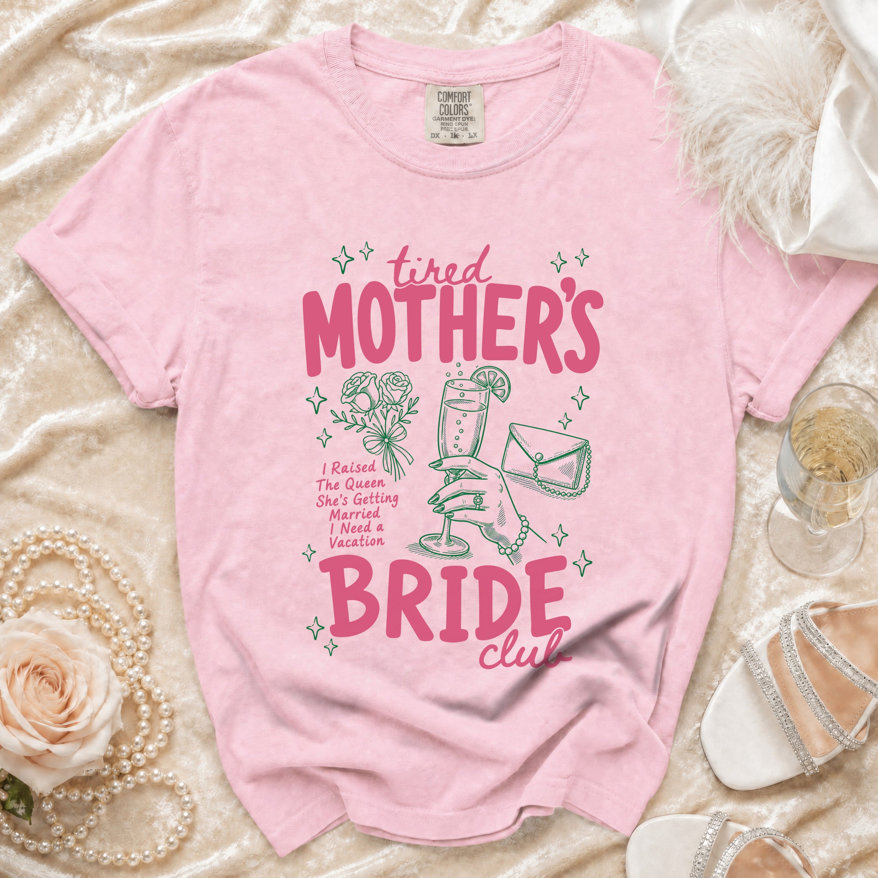 Pink t-shirt with "tired MOTHER'S BRIDE club" graphic.