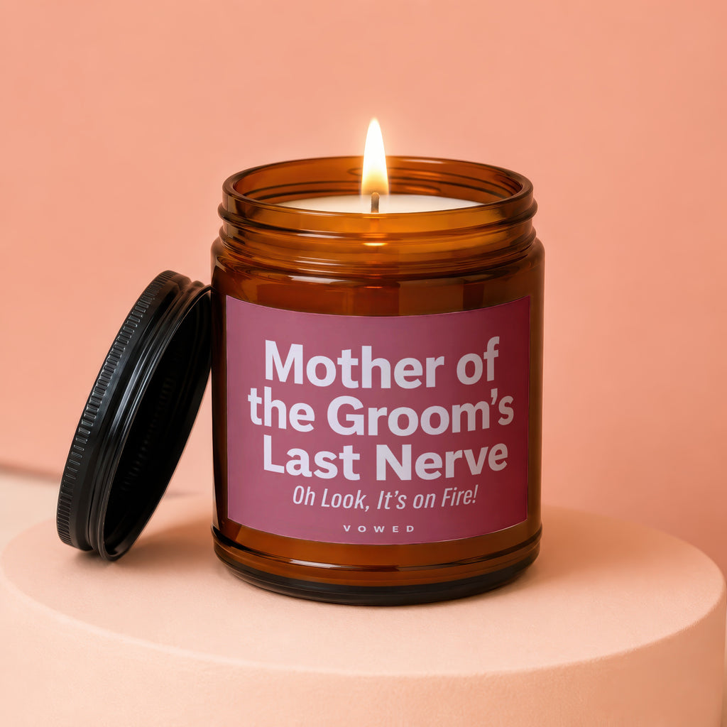 Amber jar candle lit with text "Mother of the Groom's Last Nerve".