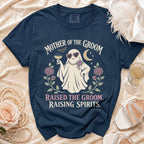 Dark blue t-shirt with "Mother of the Groom" ghost graphic and "Raised the Groom. Raising Spirits." text.
