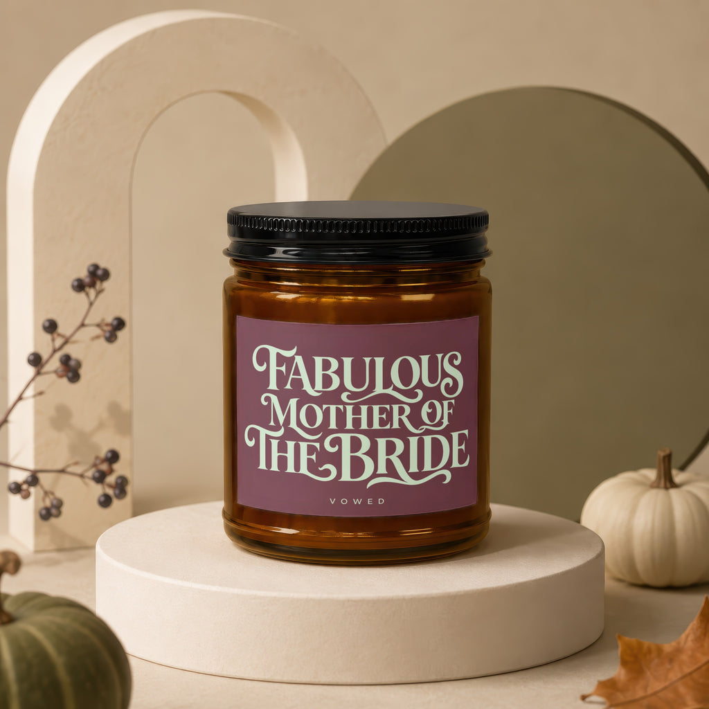 Candle with text "Fabulous Mother of the Bride Vowed" on a riser.