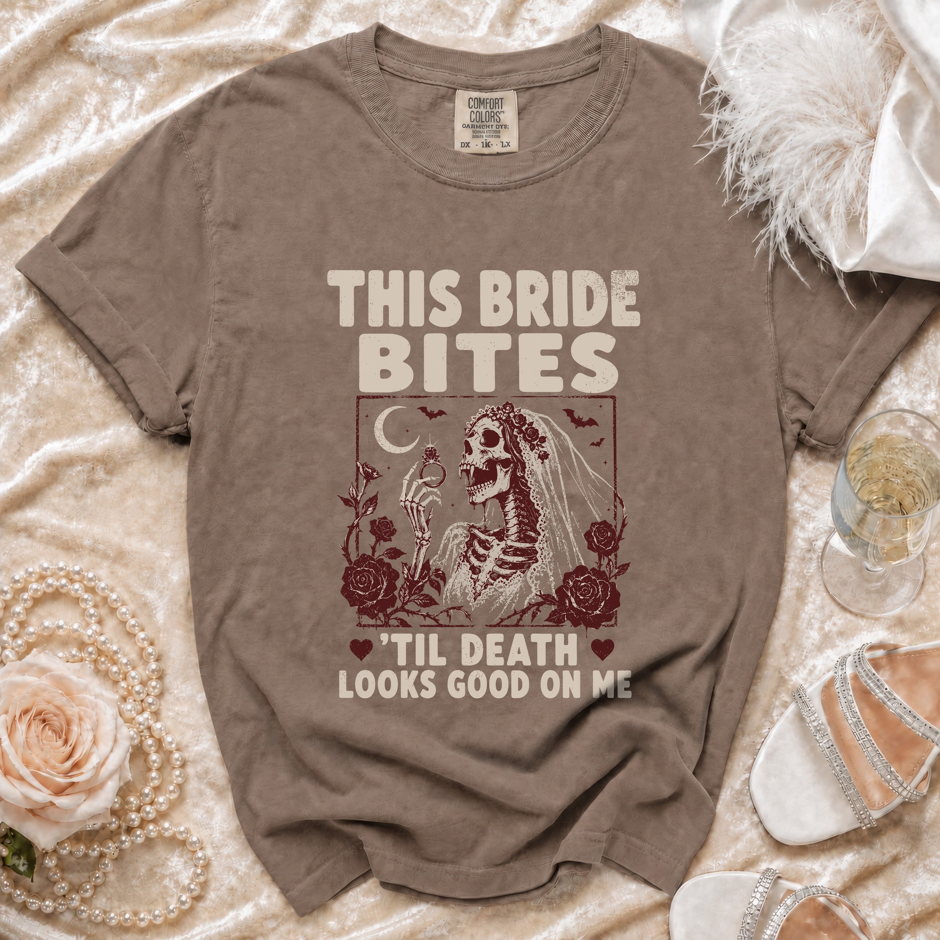 T-shirt with skeleton bride graphic saying "This Bride Bites 'Til Death Looks Good On Me".