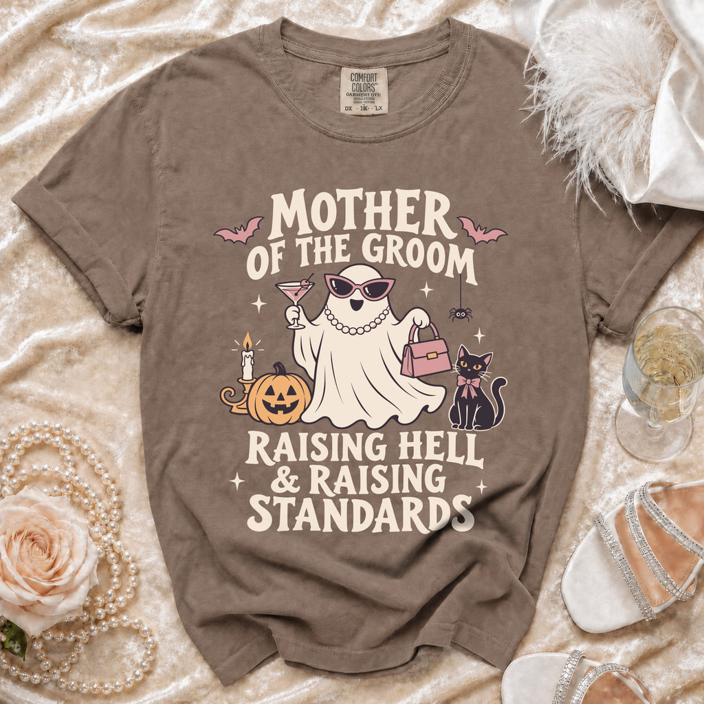 Brown t-shirt with "Mother of the Groom Raising Hell & Raising Standards" graphic.