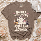 Brown t-shirt with "Mother of the Groom Raising Hell & Raising Standards" graphic.