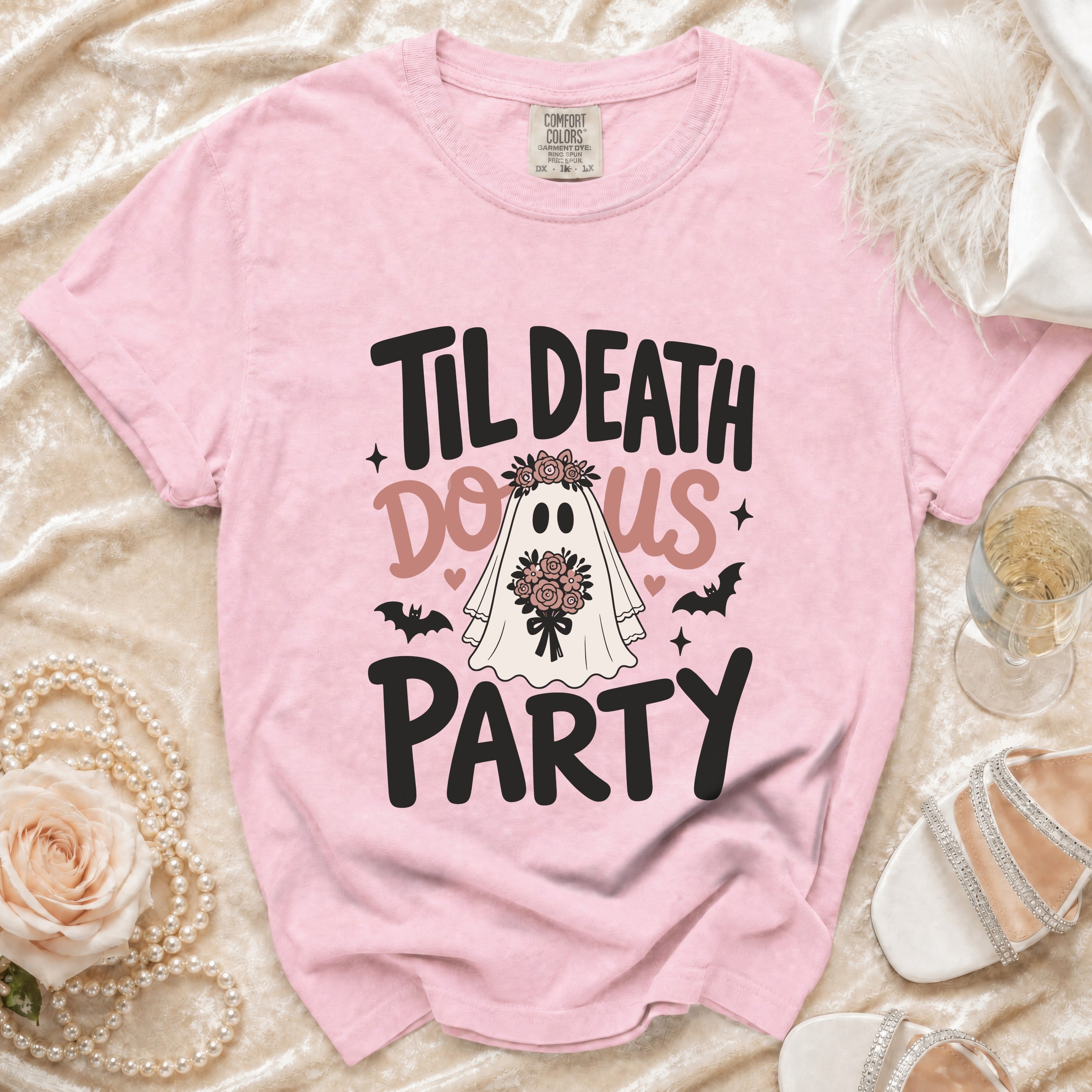 Pink t-shirt with "Til Death Do Us Party" ghost design and bats.