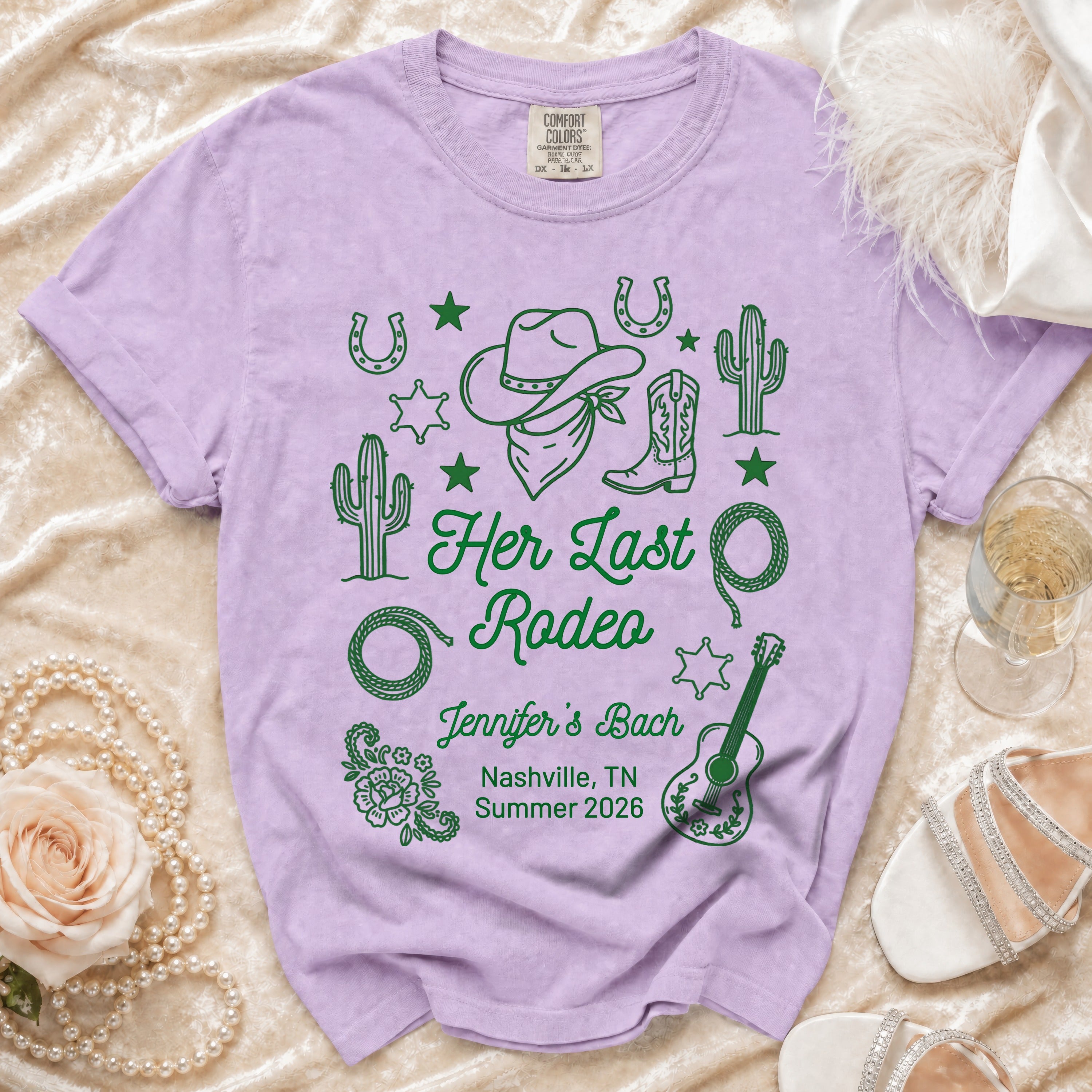 T-shirt with "Her Last Rodeo" design, cactus, cowboy hat, and boots.