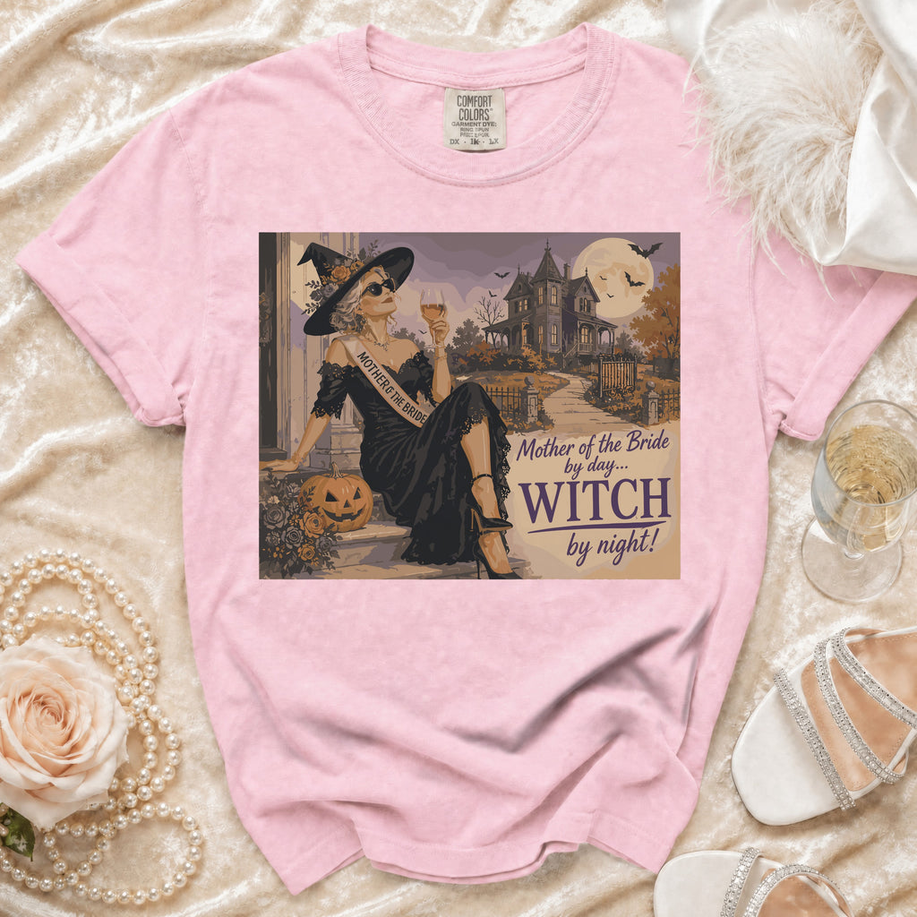 Pink t-shirt with "Mother of the Bride by day... Witch by night!" graphic.