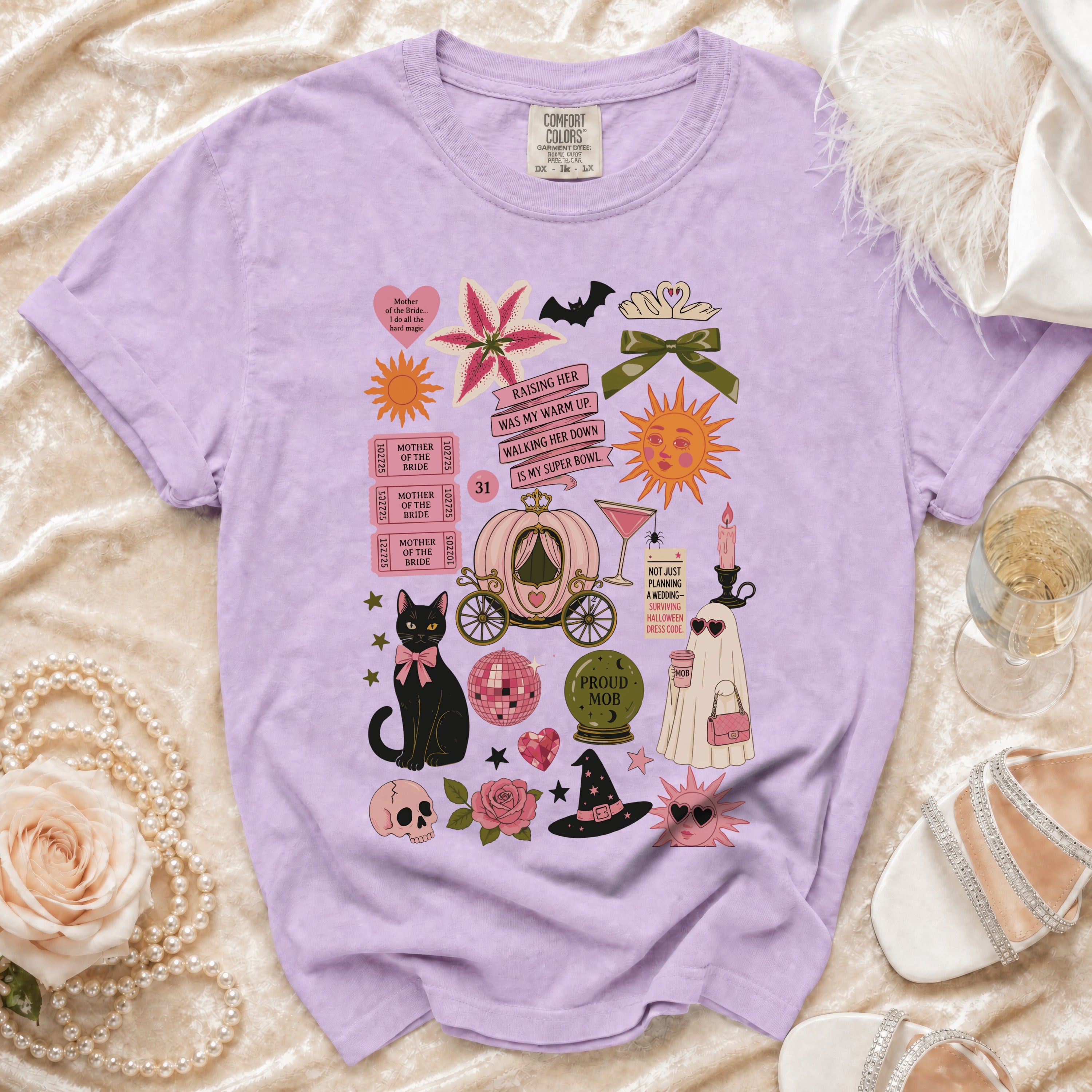 Lilac t-shirt with Halloween and wedding themed graphics and text.