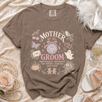 Brown t-shirt with "Mother of the Groom" design, spooky dancing, and cake.