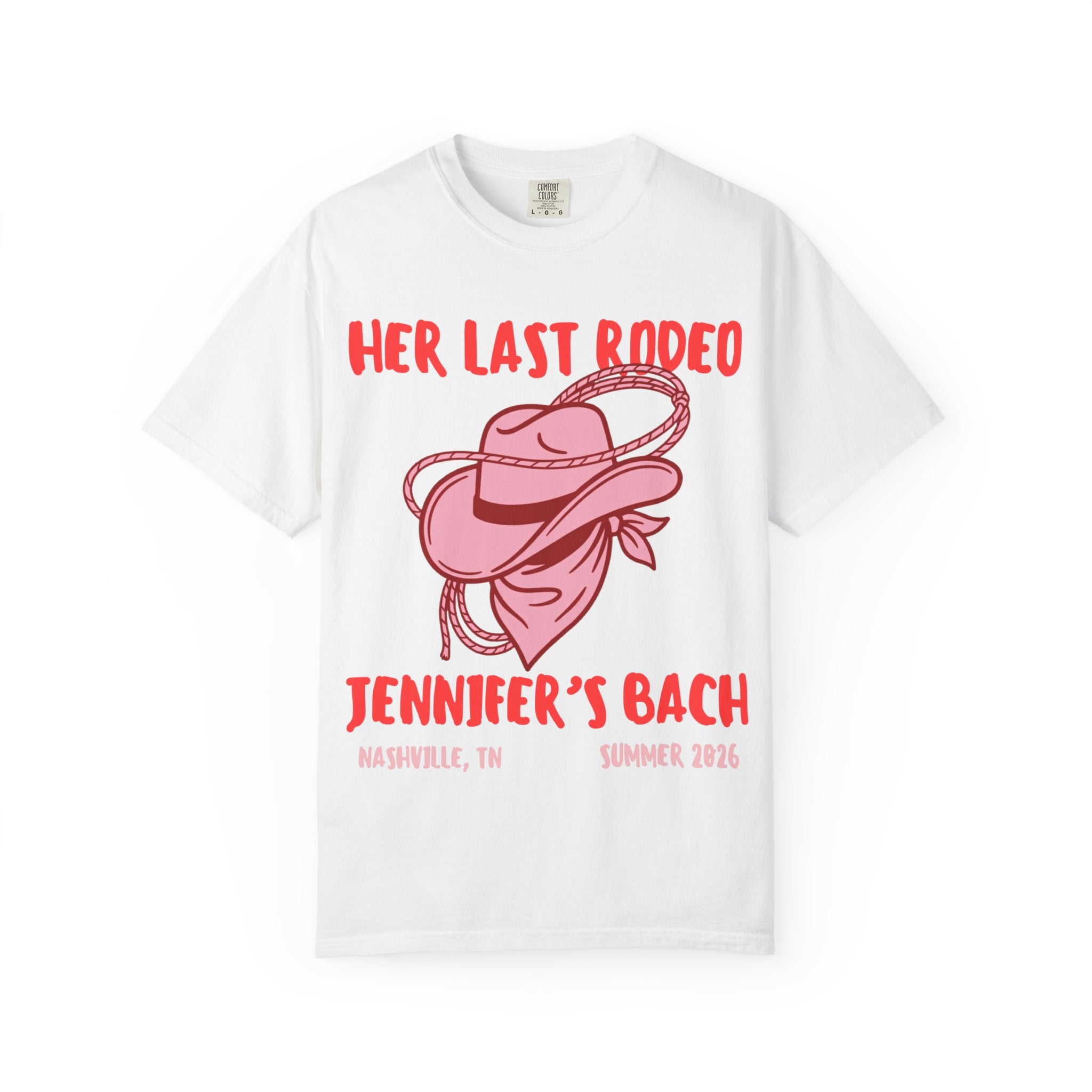 White t-shirt with "Her Last Rodeo" design, cowboy hat, and rope.