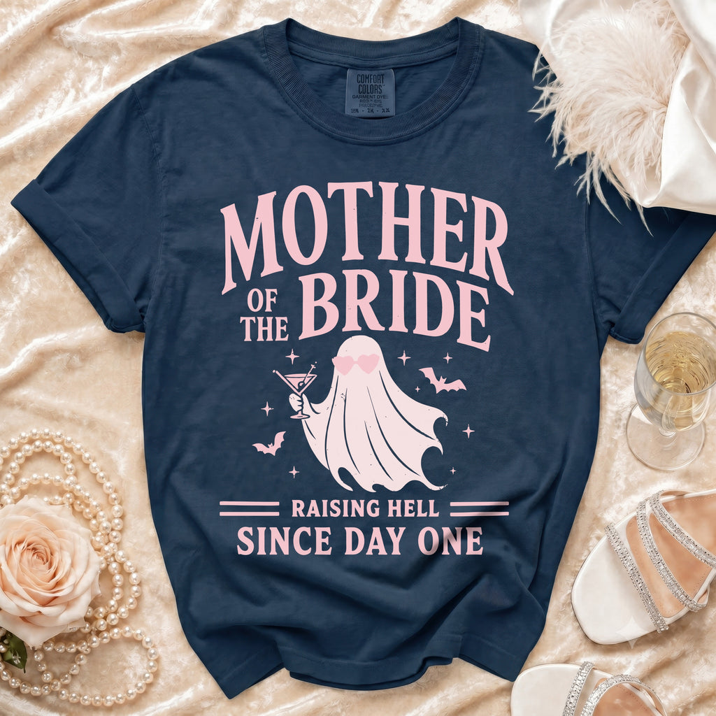 Navy t-shirt with "Mother of the Bride Raising Hell Since Day One" text and a ghost graphic.