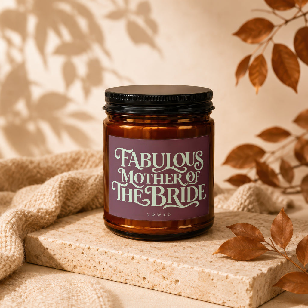 Amber candle with "Fabulous Mother of the Bride" text on a plum label.