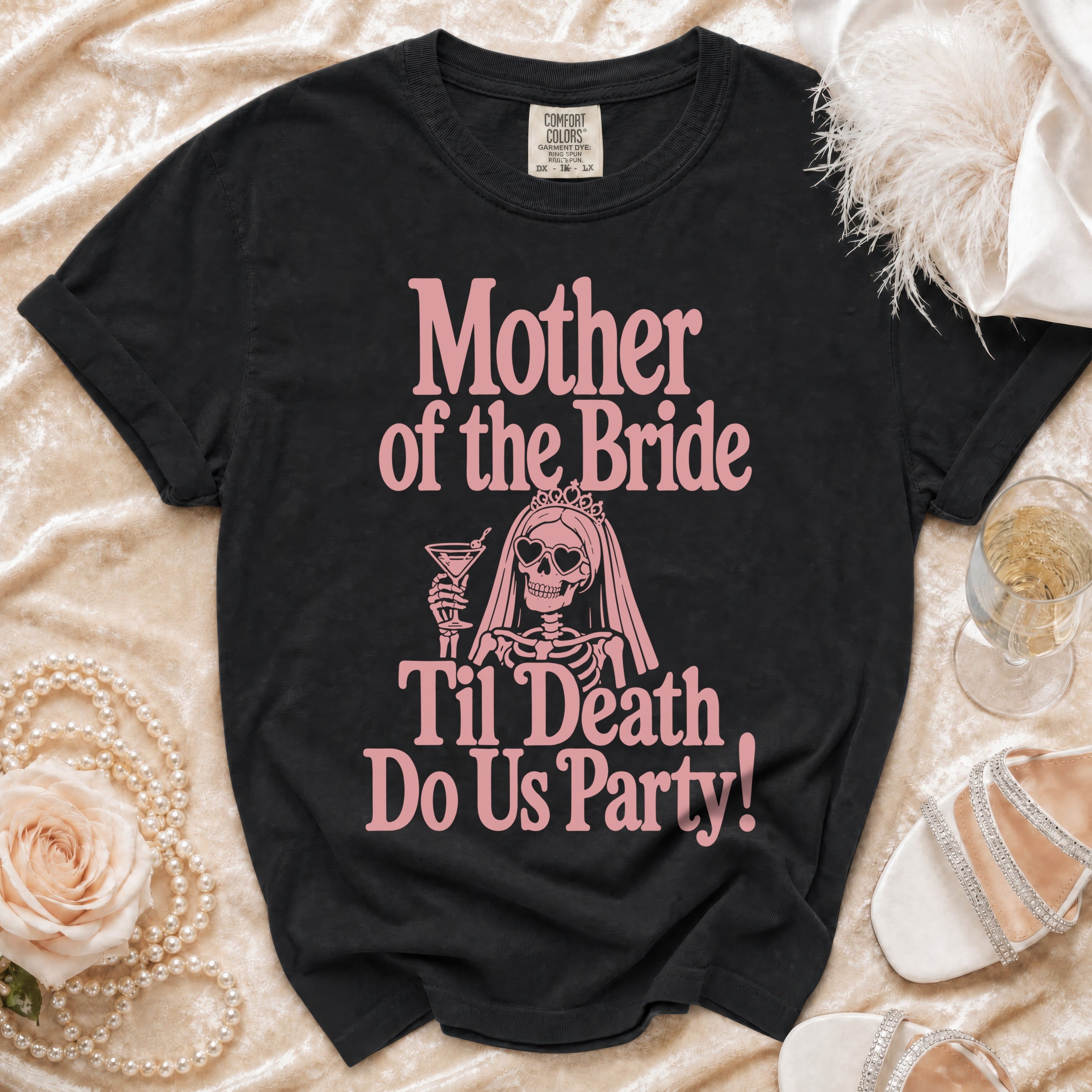 Black t-shirt with pink text "Mother of the Bride Til Death Do Us Party!" and skeleton graphic.