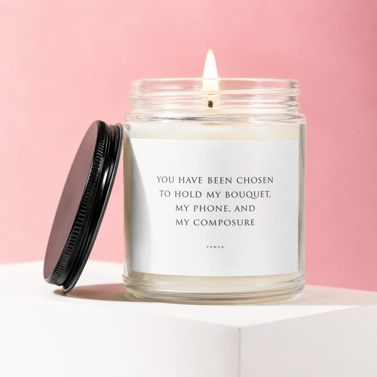 Scented candle with "You have been chosen to hold my bouquet, my phone, and my composure" text.