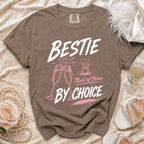 Brown t-shirt with "BESTIE Maid of Honor BY CHOICE" text, champagne glasses, and ring graphic.