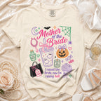 Cream t-shirt with "Mother of the Bride" Halloween-themed graphic and text.
