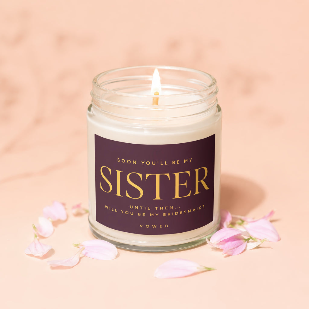 Candle asking "Will you be my bridesmaid?" with "Sister" text.