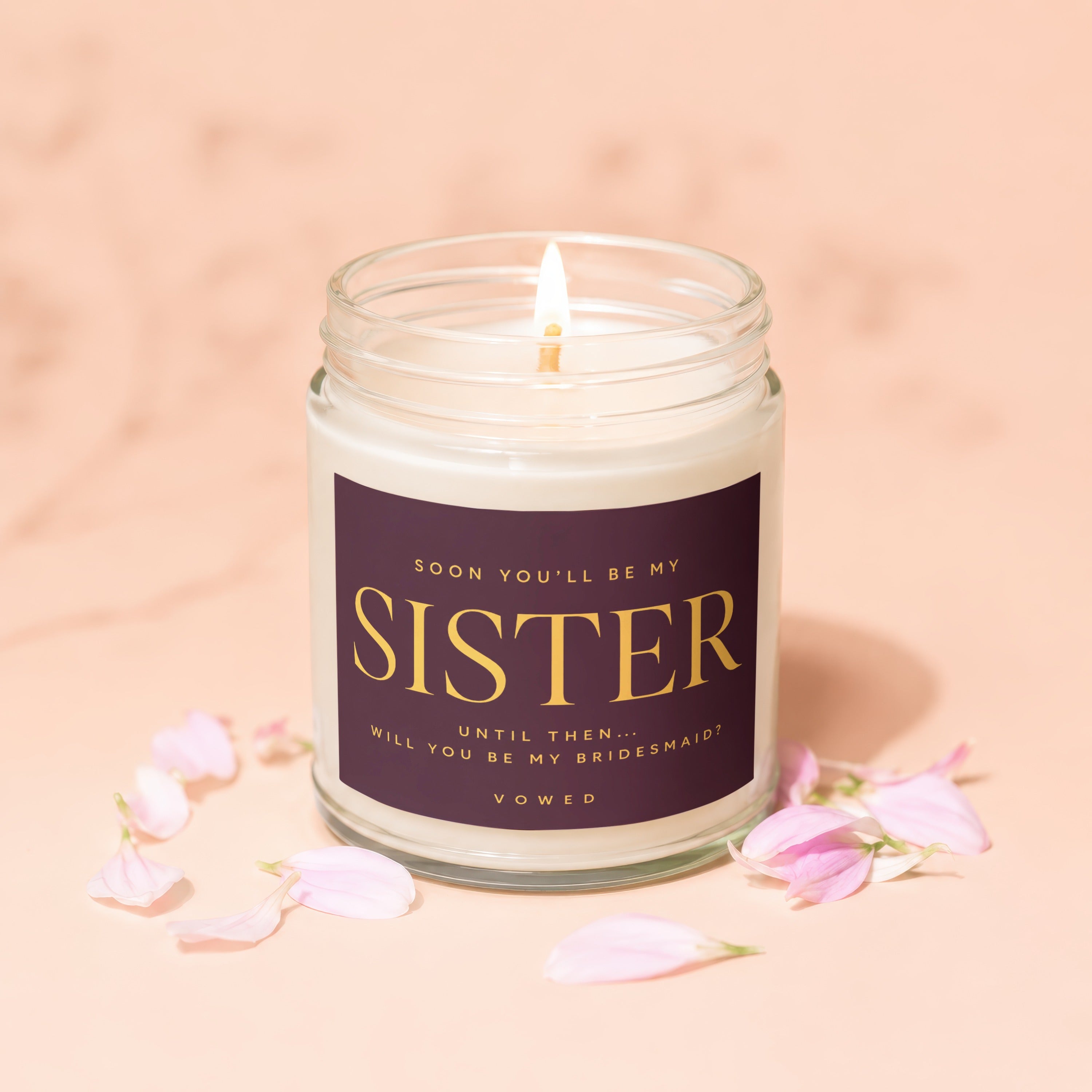 Candle asking "Will you be my bridesmaid?" with "Sister" text.