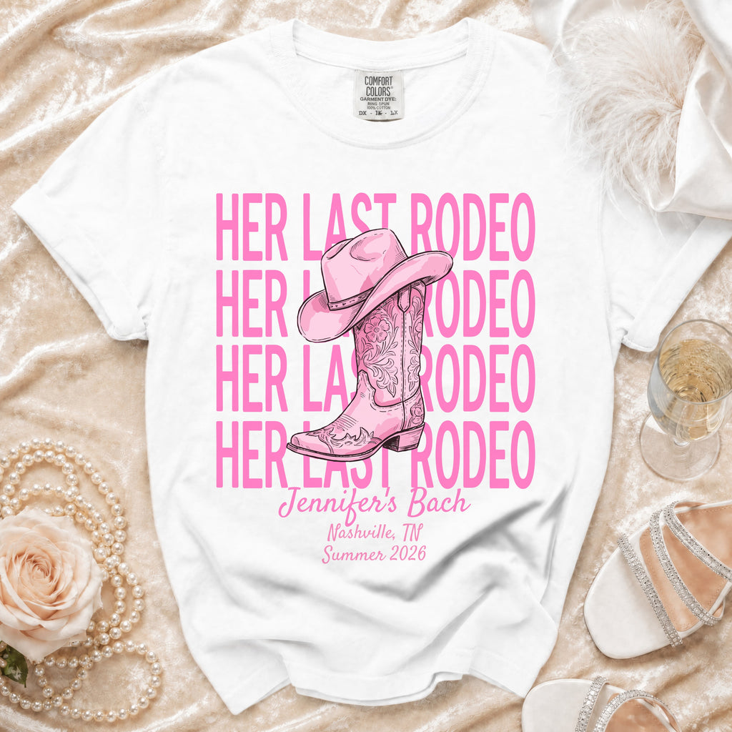 White t-shirt with "HER LAST RODEO" and cowboy boot graphic.