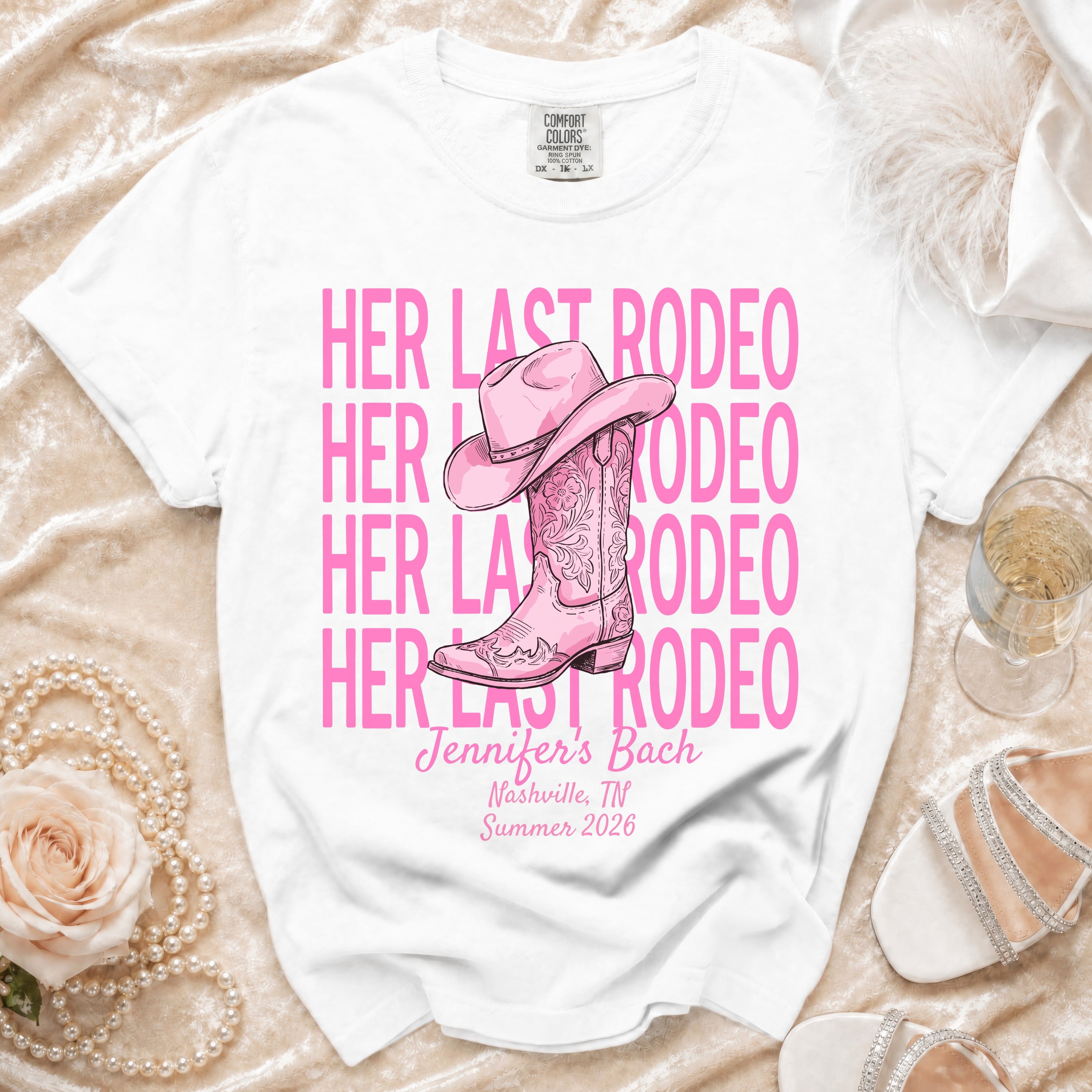 White t-shirt with "HER LAST RODEO" and cowboy boot graphic.
