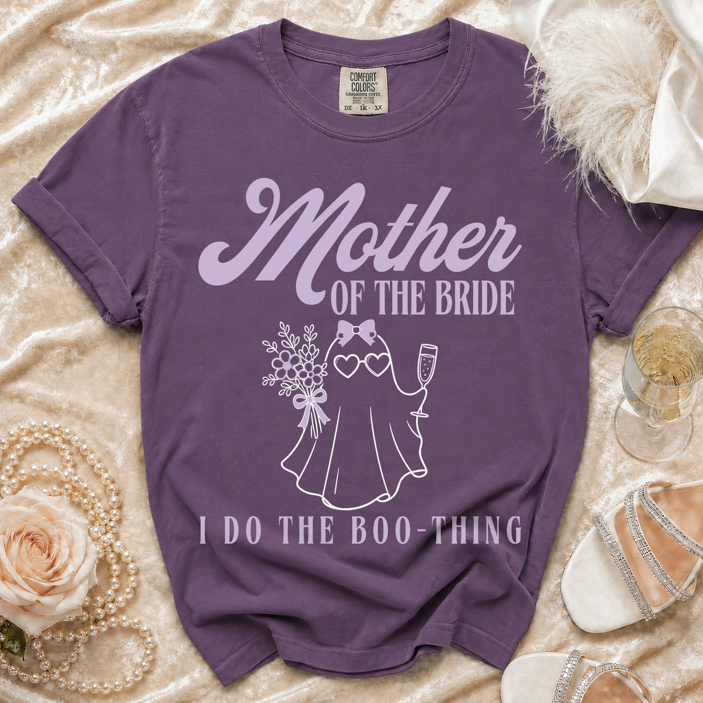 Purple t-shirt with "Mother OF THE BRIDE" and ghost graphic.