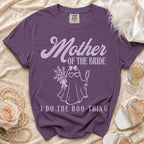 Purple t-shirt with "Mother OF THE BRIDE" and ghost graphic.