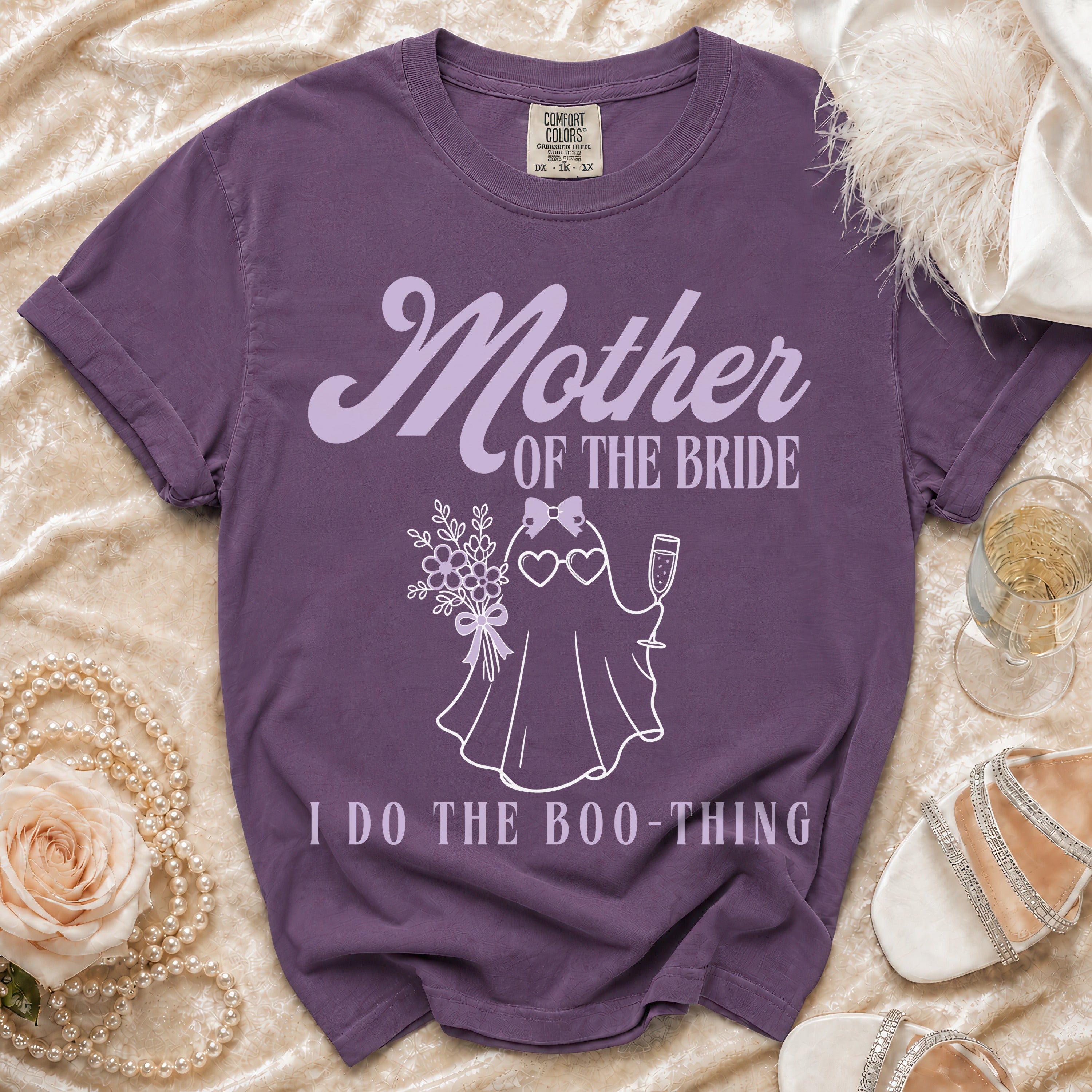 Purple t-shirt with "Mother OF THE BRIDE" and ghost graphic.