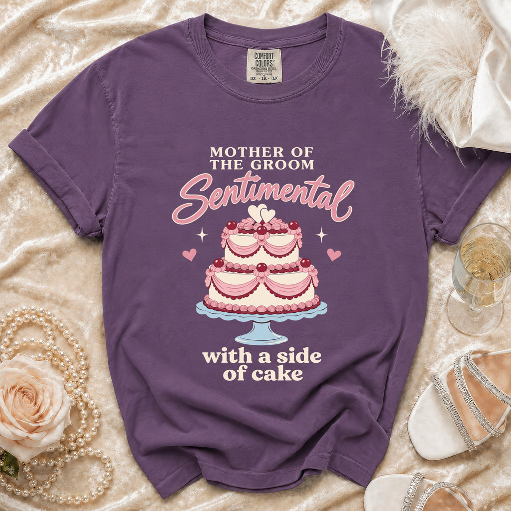 Purple t-shirt with "Mother of the Groom Sentimental with a side of cake" graphic.