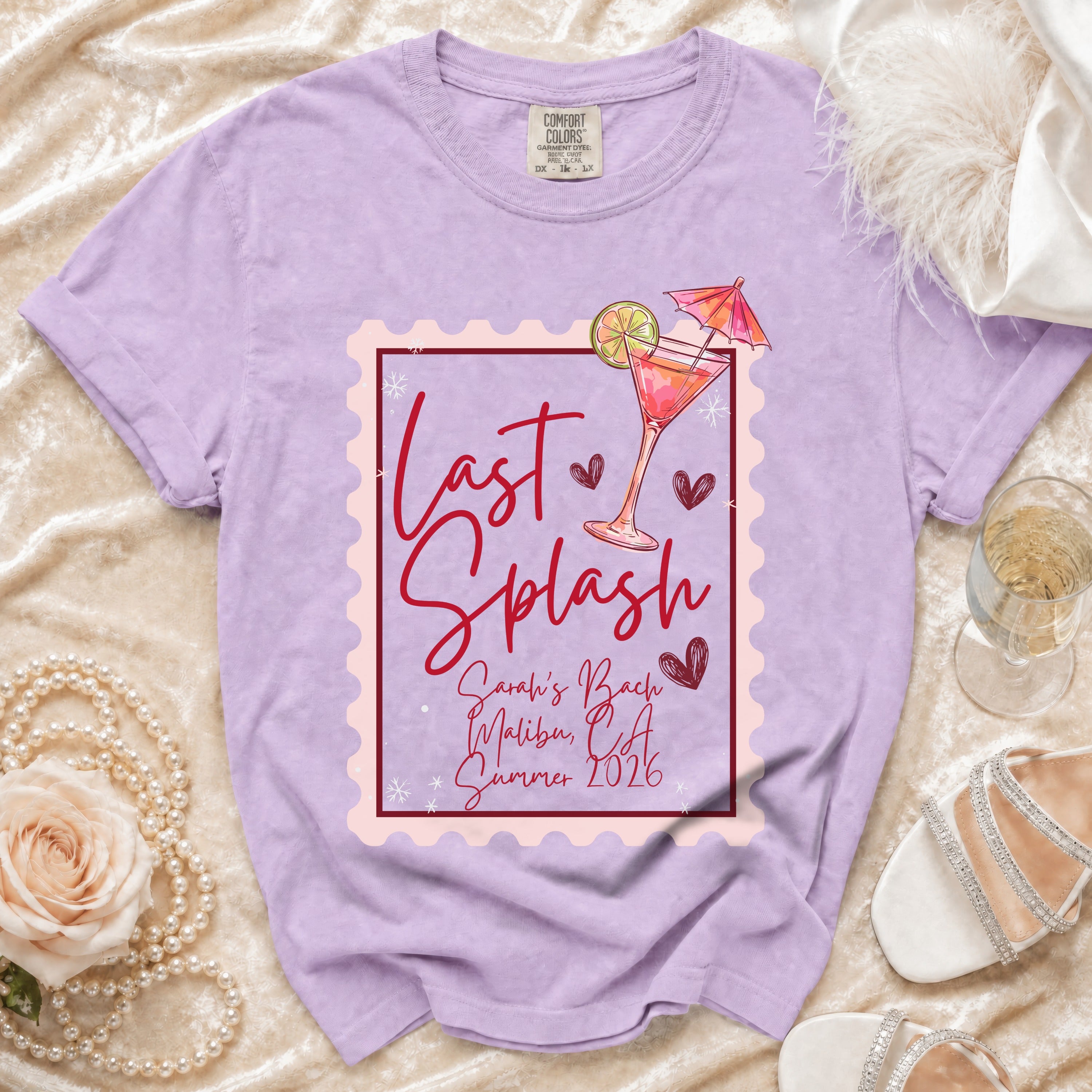 Purple Comfort Colors t-shirt with "Last Splash Sarah's Bach Malibu CA Summer 2026" graphic.
