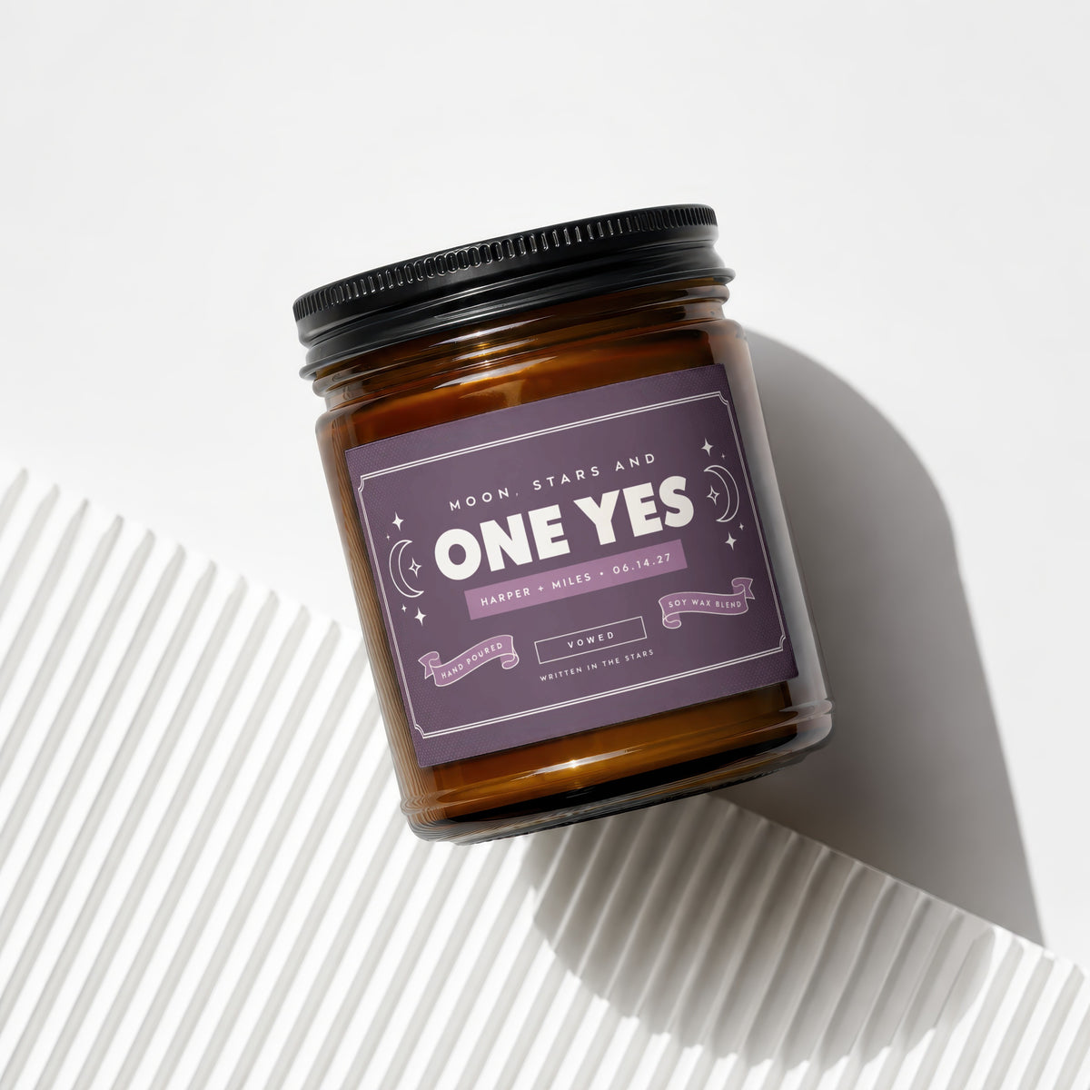 Brown glass candle "One Yes" with purple label, hand-poured soy wax blend.
