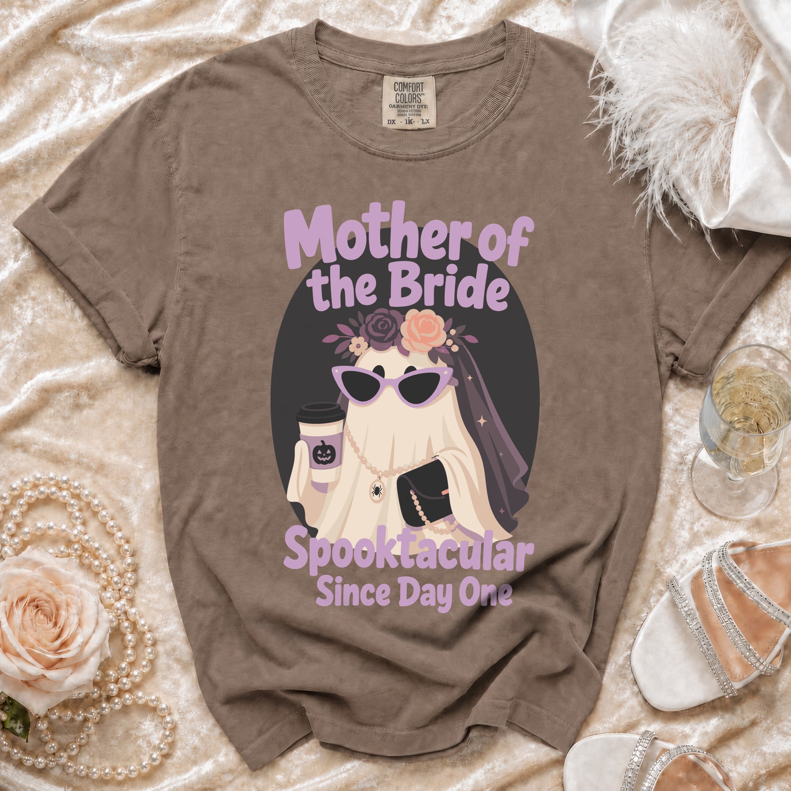 Brown t-shirt with "Mother of the Bride Spooktacular Since Day One" text and a ghost graphic.